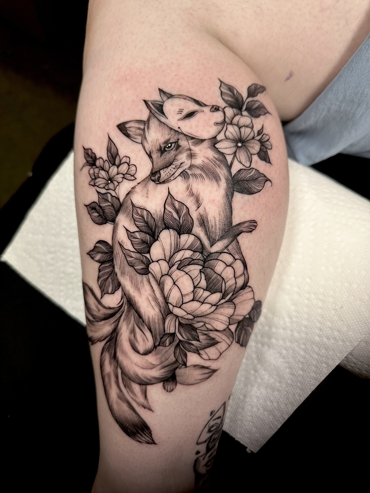 Fox and flowers tattoo